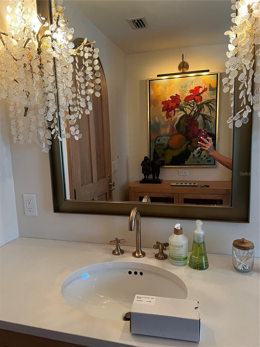 Bath before flood, countertop and light fixtures undamaged