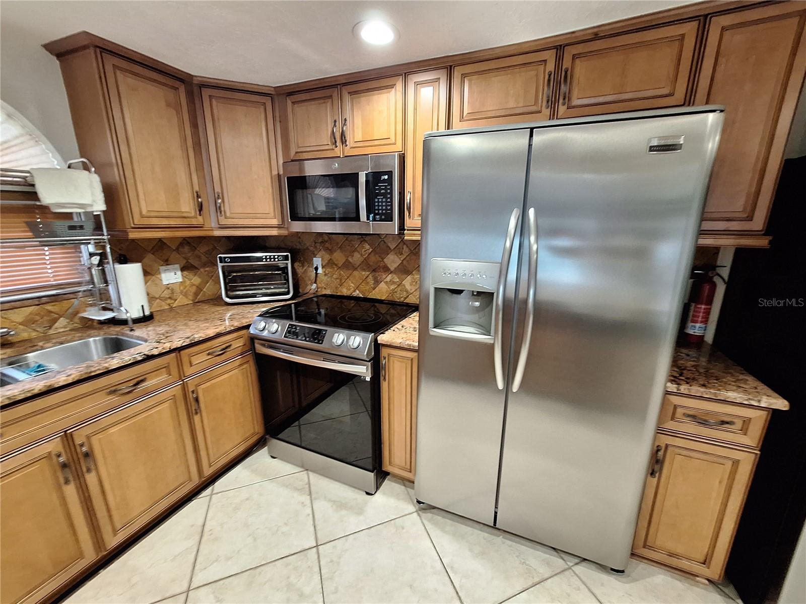 Lovely Cabinetry and Granite Countertops