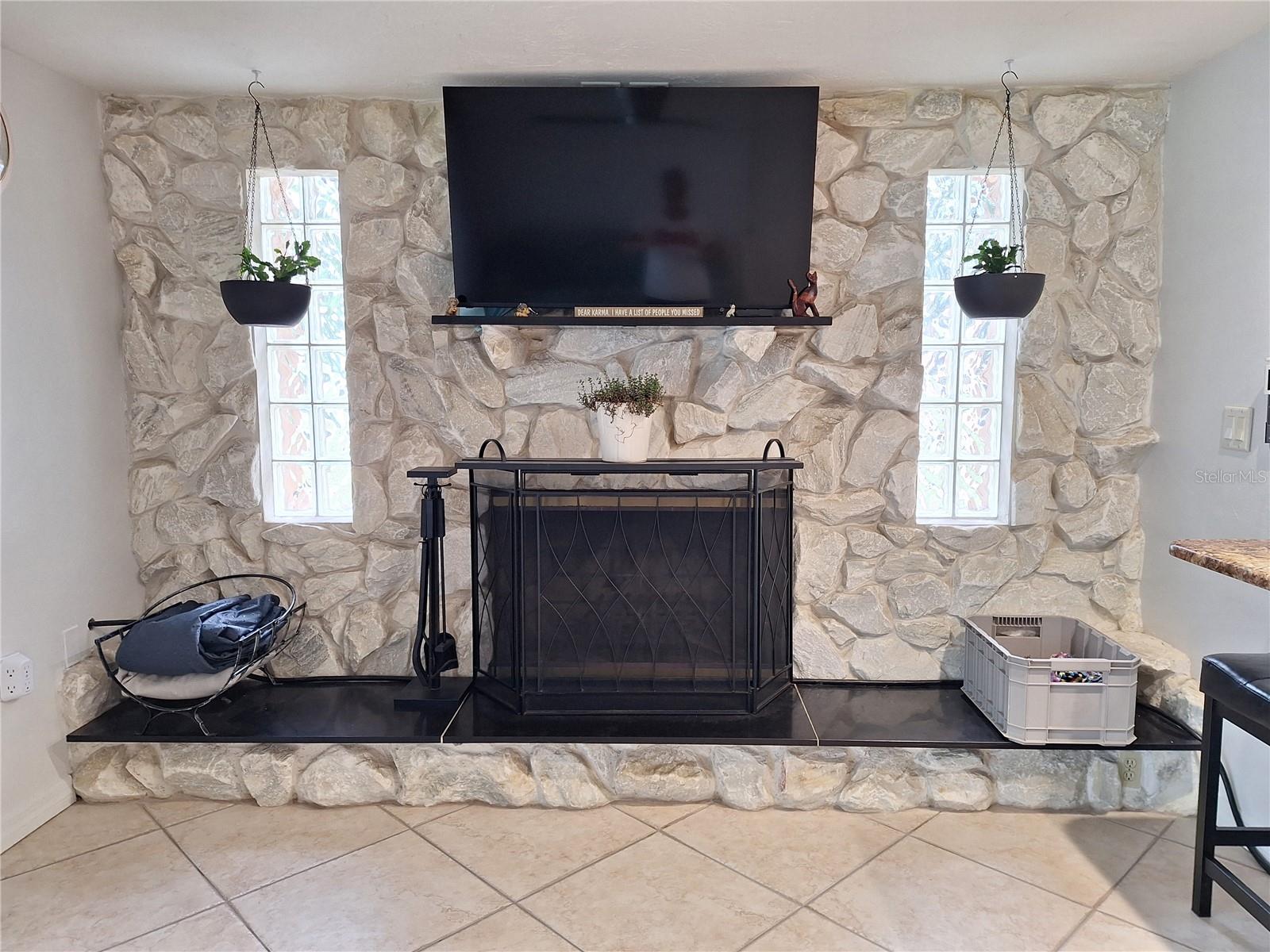 Stunning Wood Burning White Stone Fireplace