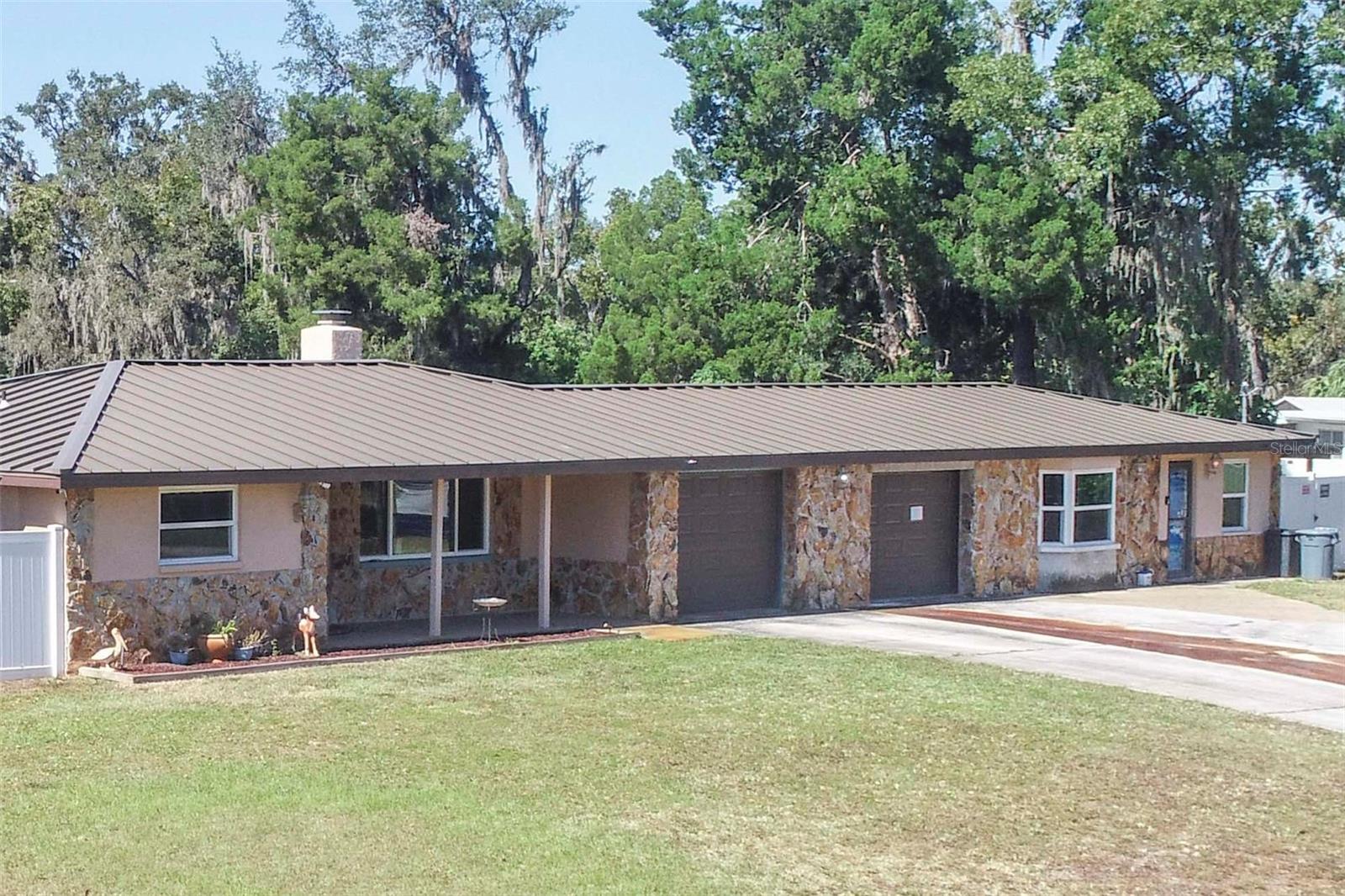 Larger 3/2 home on left.  Right side has 1/1 Apartment