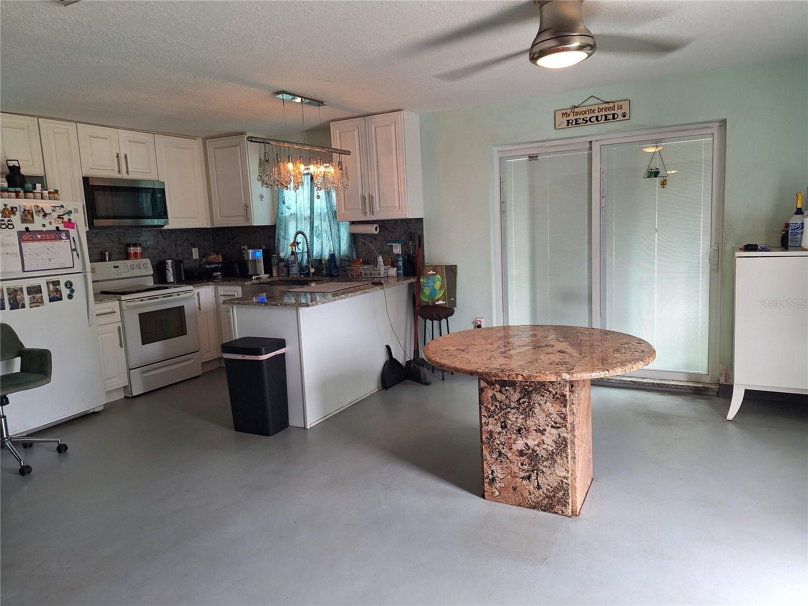 Great Room- Dining has Granite Table