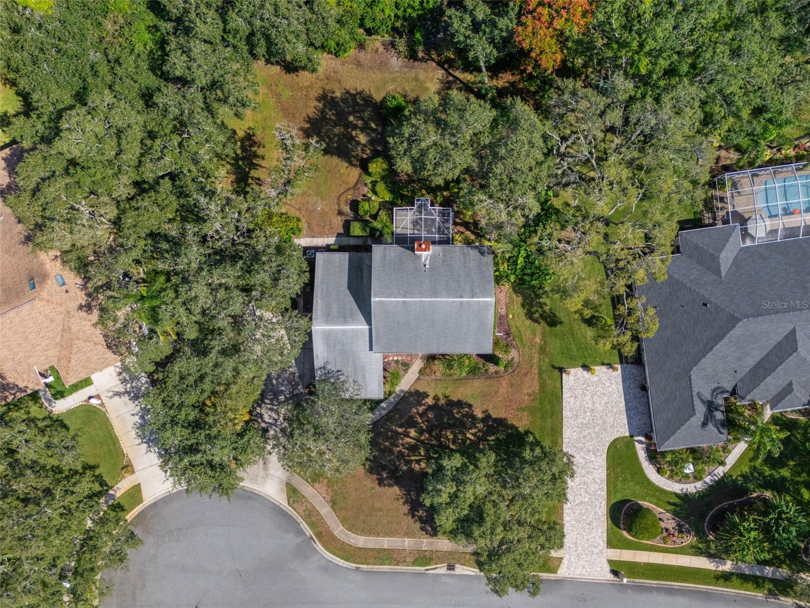 Rear of Home with Beautiul Landscaping