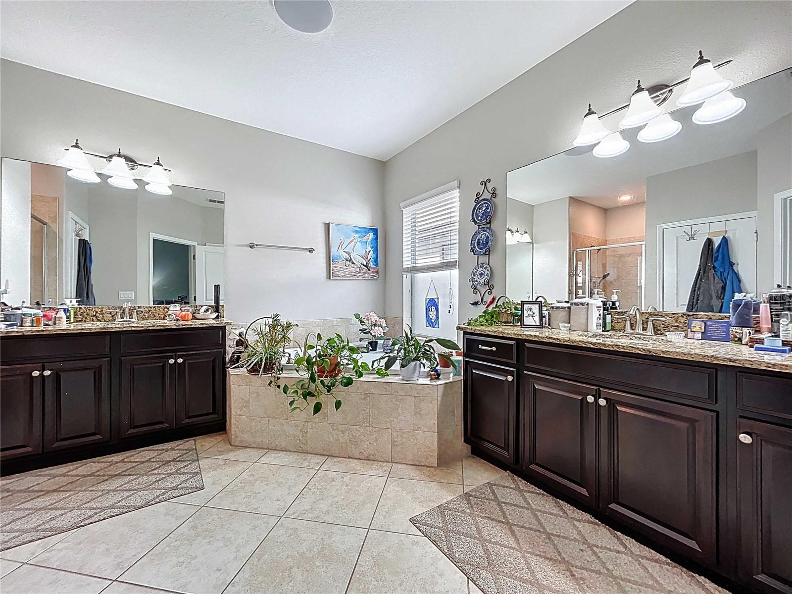 Spacious Primary Bathroom with Individual Hers/His Sink Areas