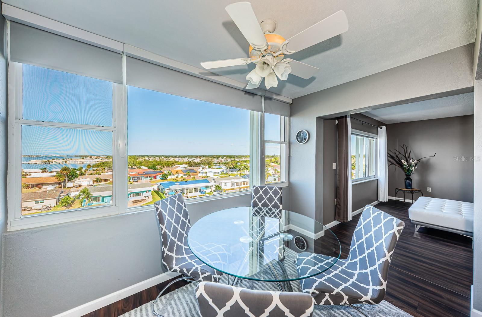 Florida room being used as a dining room just of the bedroom and living room
