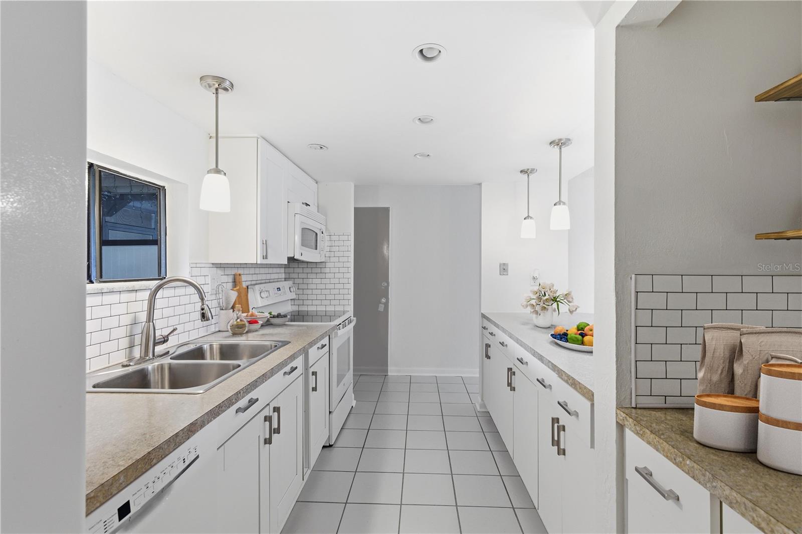 renovated kitchen with White Shaker Cabinets