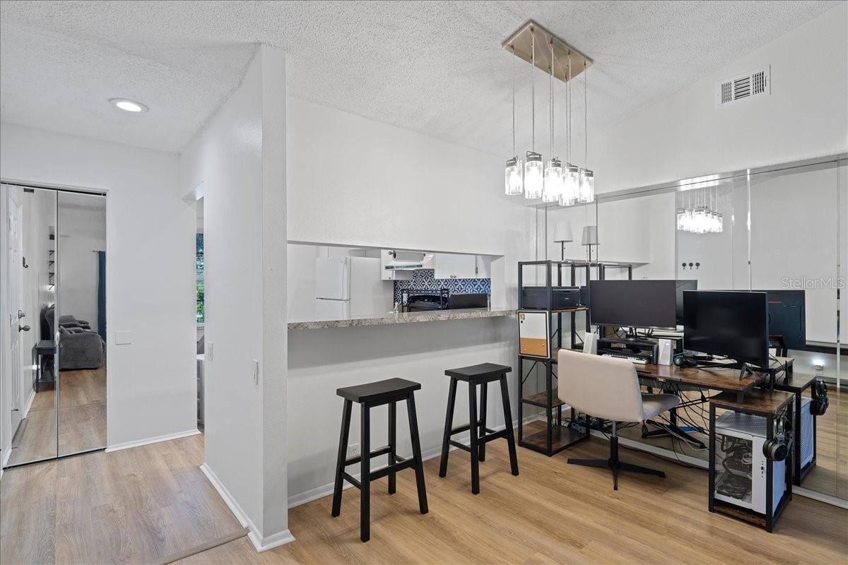 Dining Area with passthrough window to kitchen perfect for casual meals