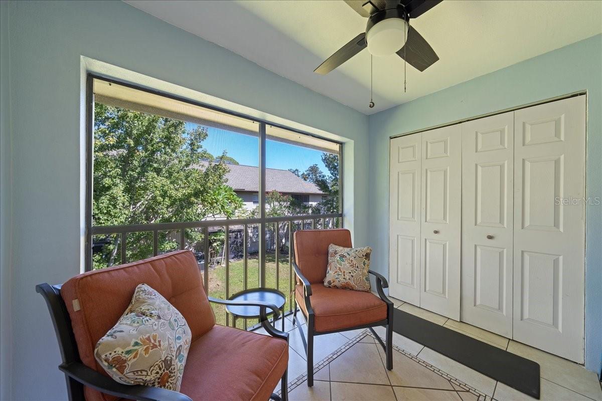 Balcony with access from living room and primary bedroom. Includes laundry closet