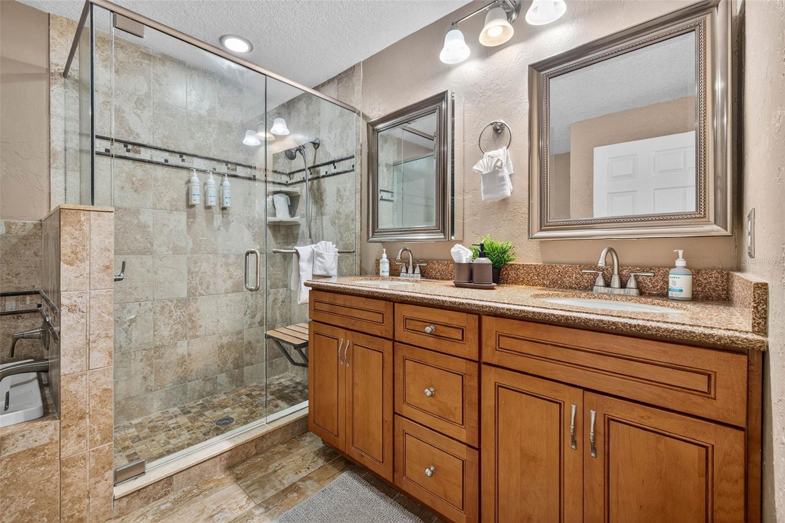 main bath with walk in shower, double vanity and soaker tub!
