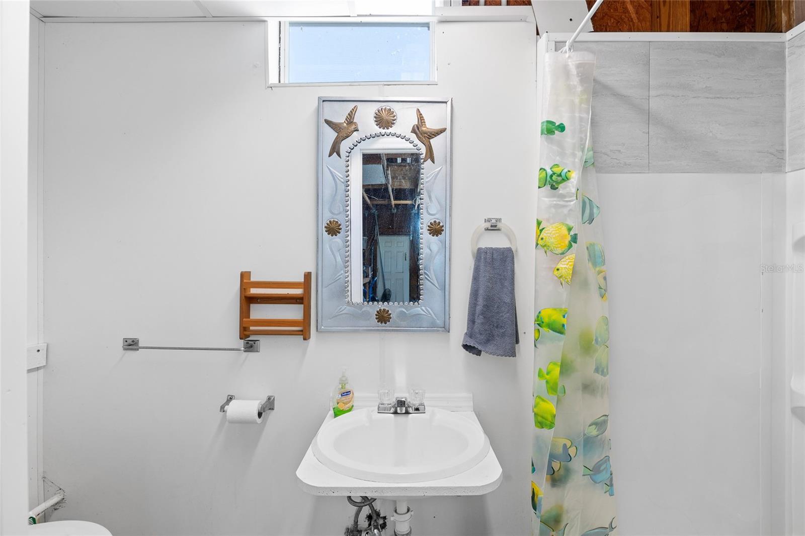 Full Bathroom #3  Very conveniently located inside the garage for after pool or yard maintenance