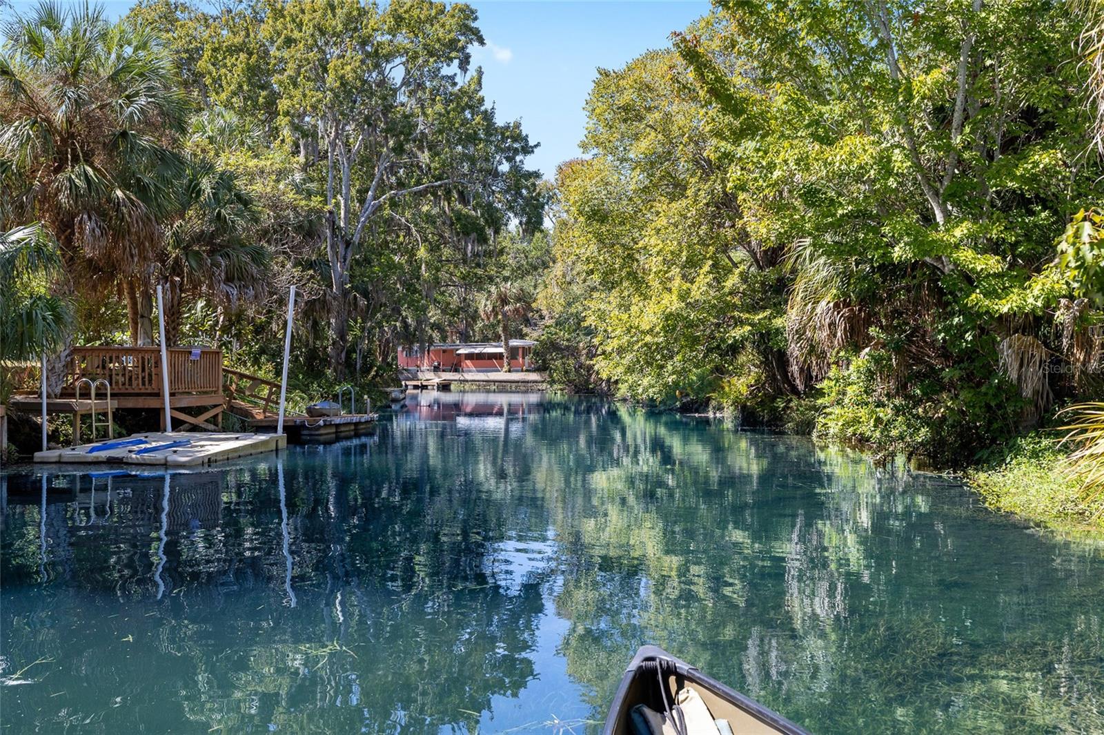 This home is located Directly across the street from the Weeki Wachee River.