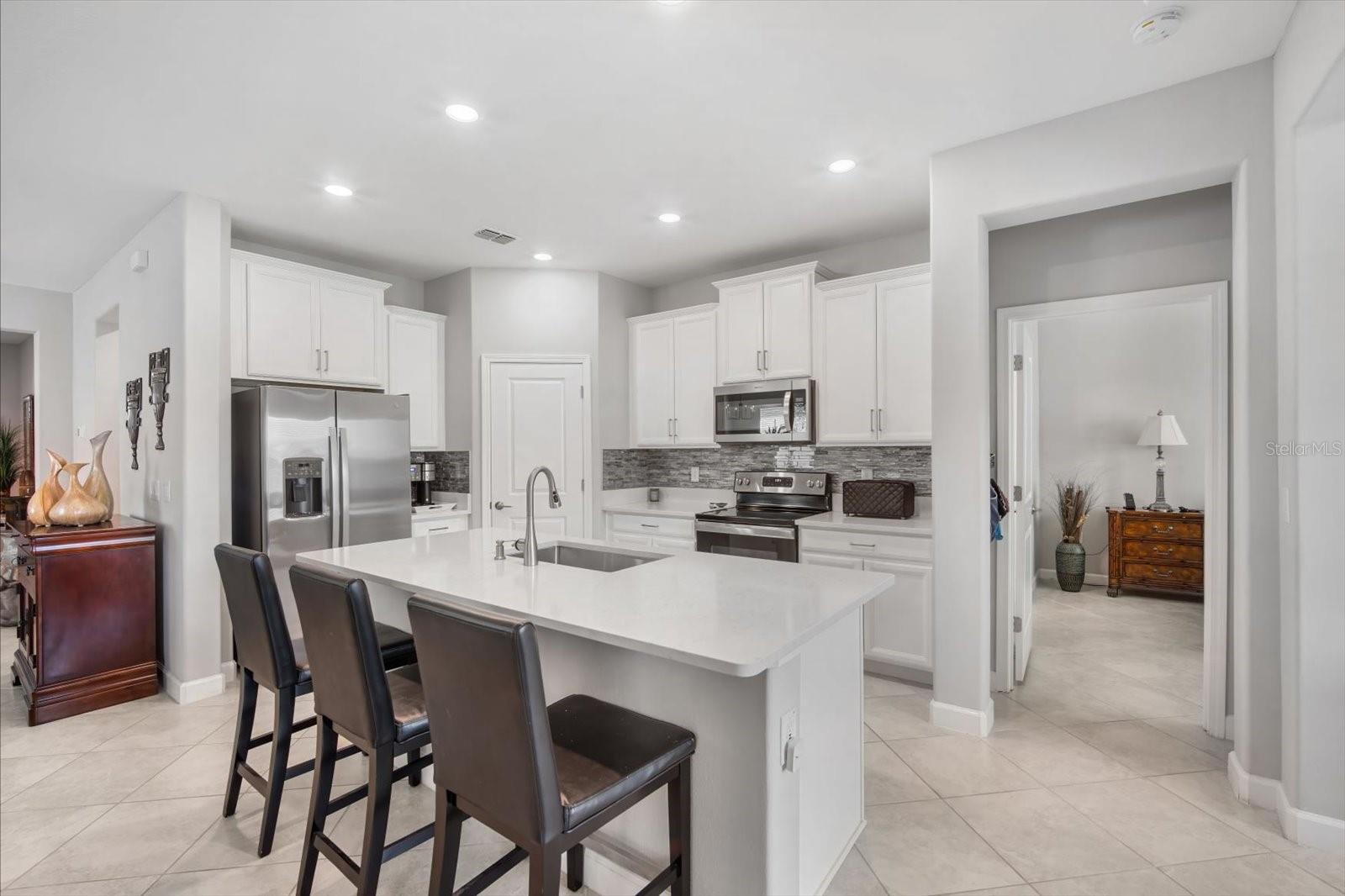 Kitchen is spacious and bright