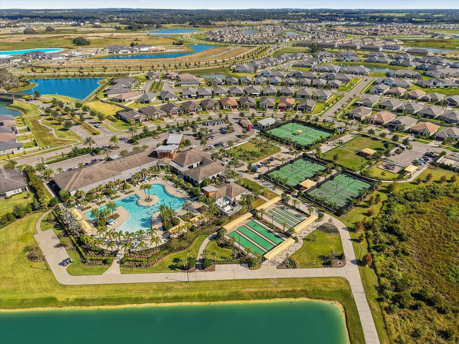 Drone of Medley amenities, zero entry pool, lap pool, boccie ball, shuffle board, tennis, pickle ball, fitness room, clubhouse, walking trail, and more!