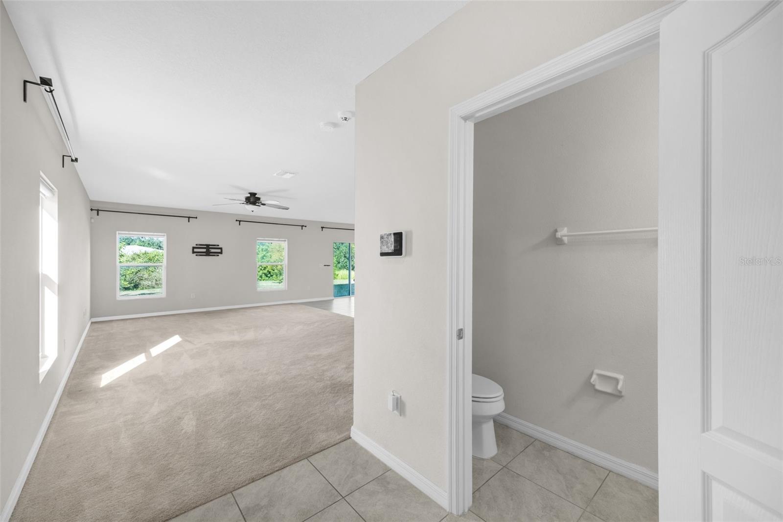 1/2 bath from entryway to Living Room