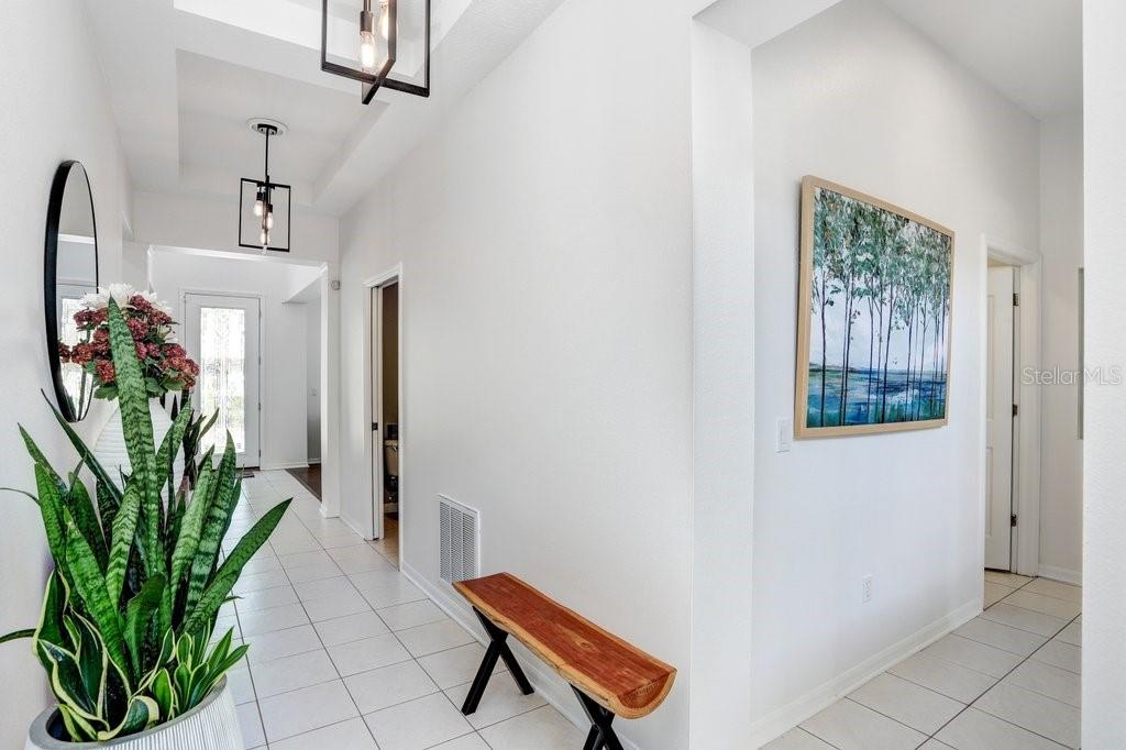 Hallway off of Living Room to Primary and Laundry Room