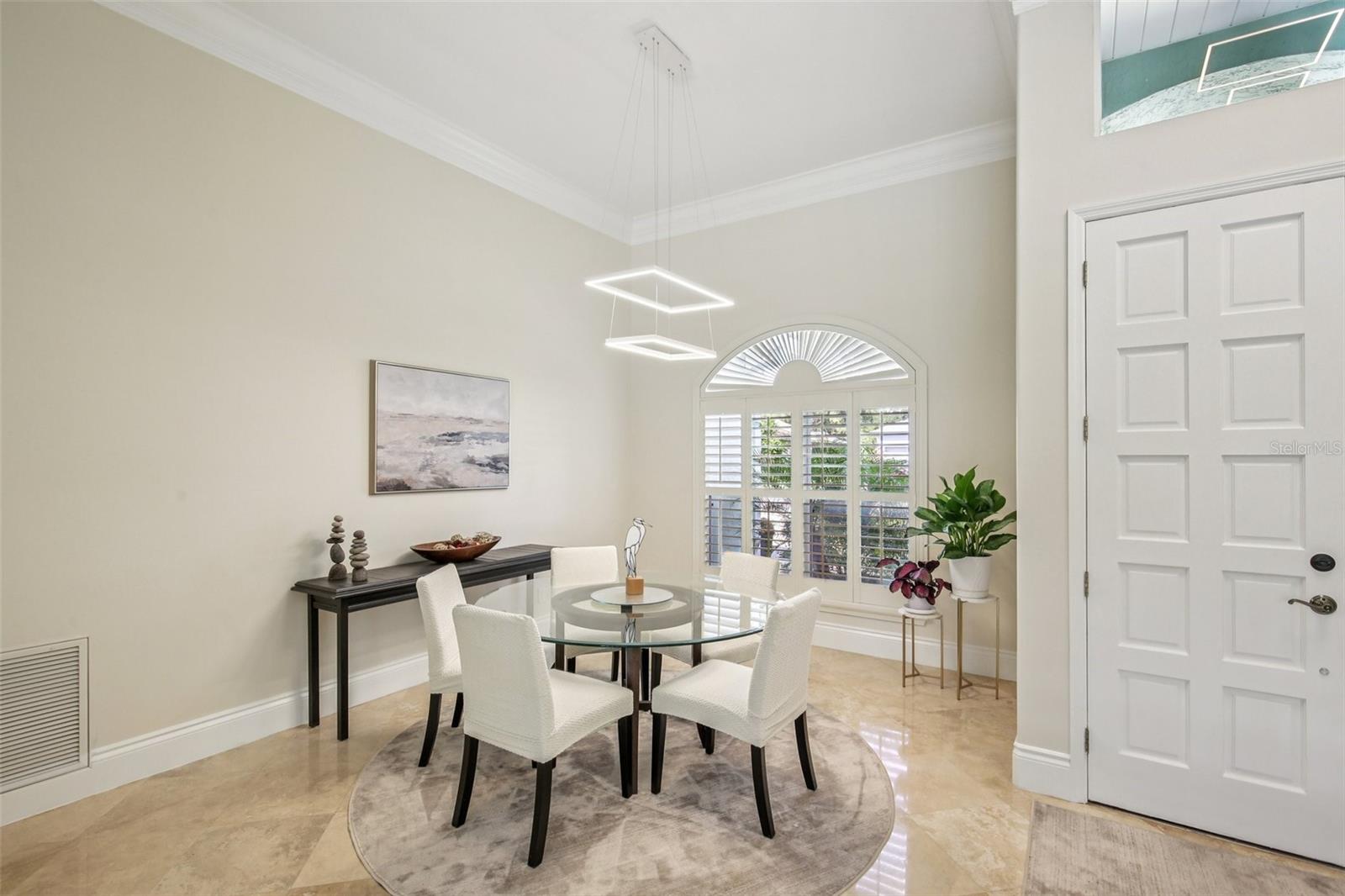 MODERN LIGHTING AT FOYER AND DINING ROOM