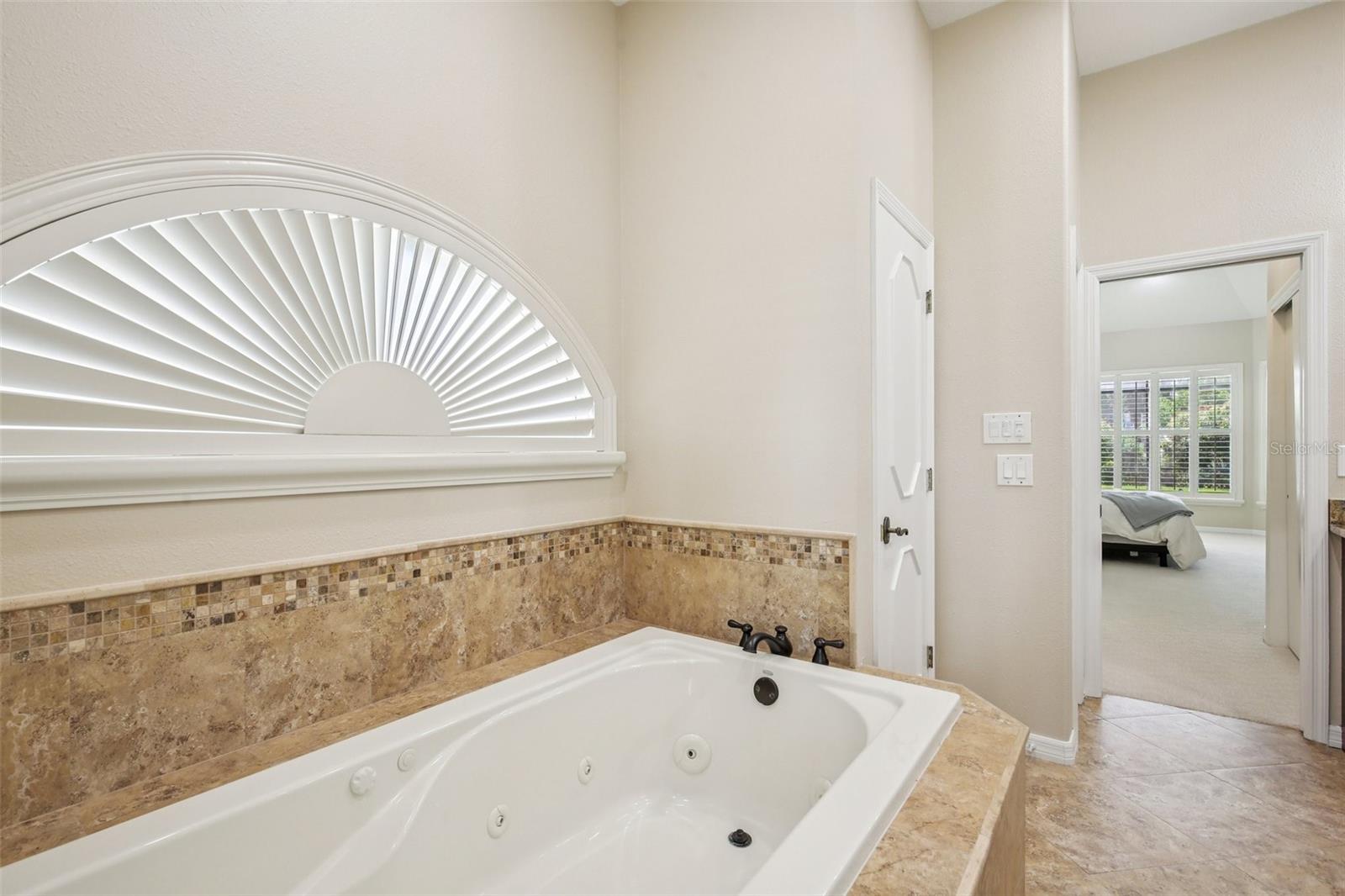 SOAKING TUB IN PRIMARY BRINGS ALL THE LUXURY