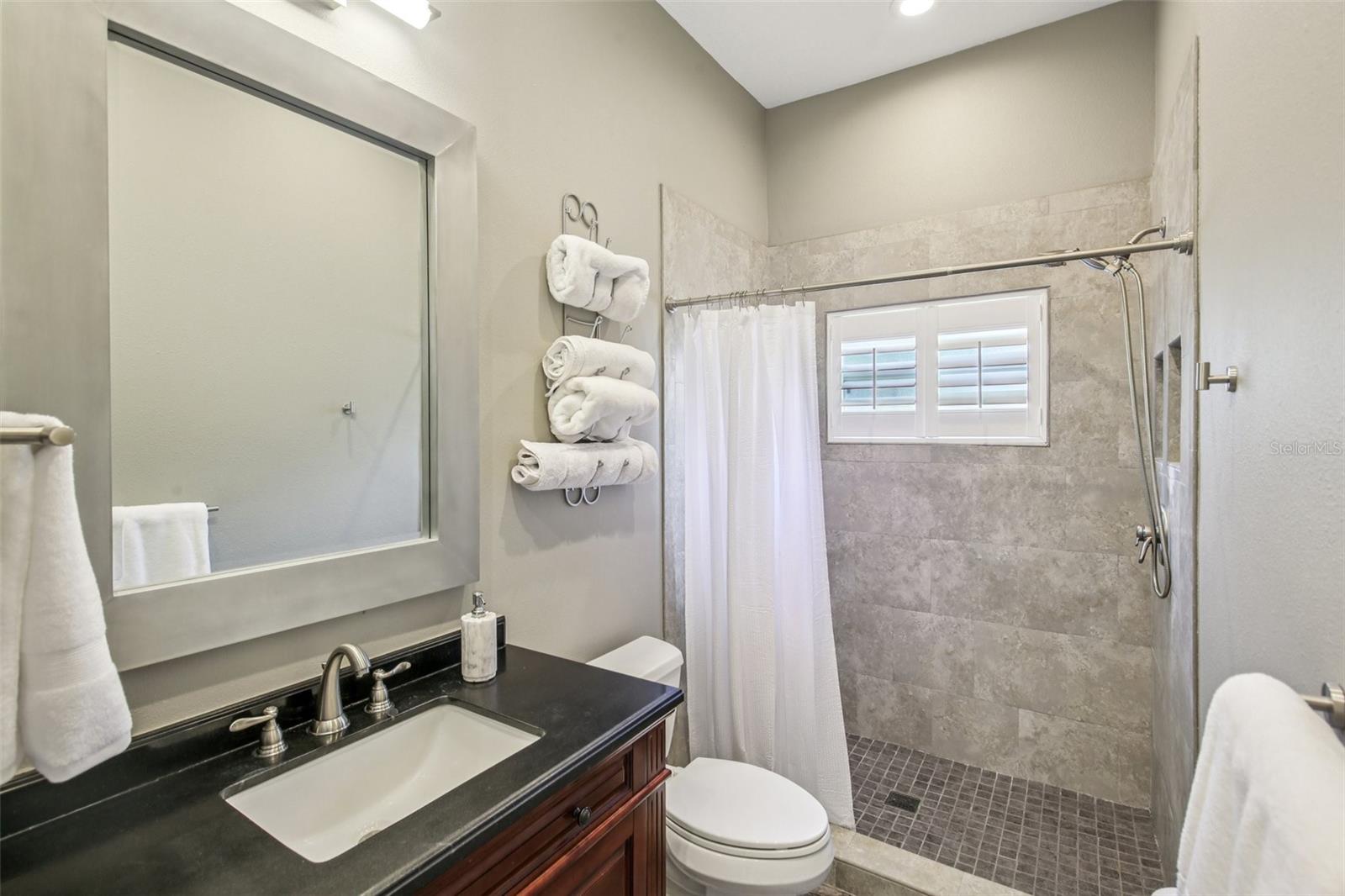 BATHROOM 3 OFF BEDROOM 5 AND POOL ACCESS