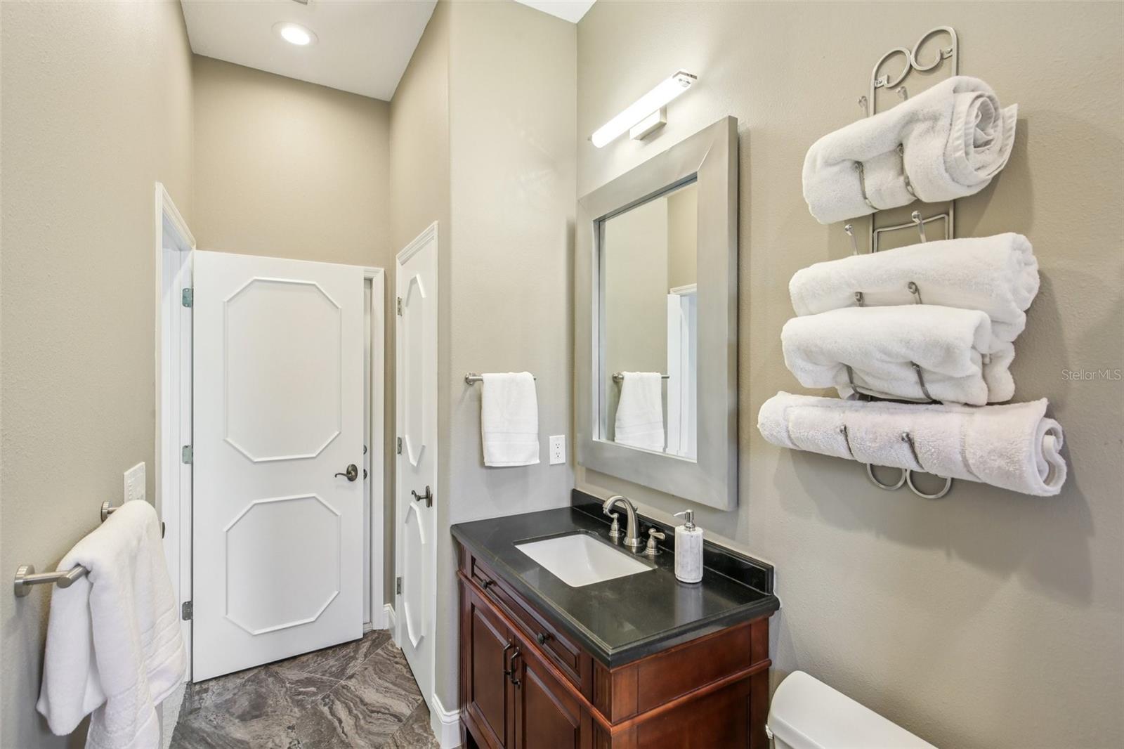 BATHROOM 3 OFF BEDROOM 5 AND POOL ACCESS