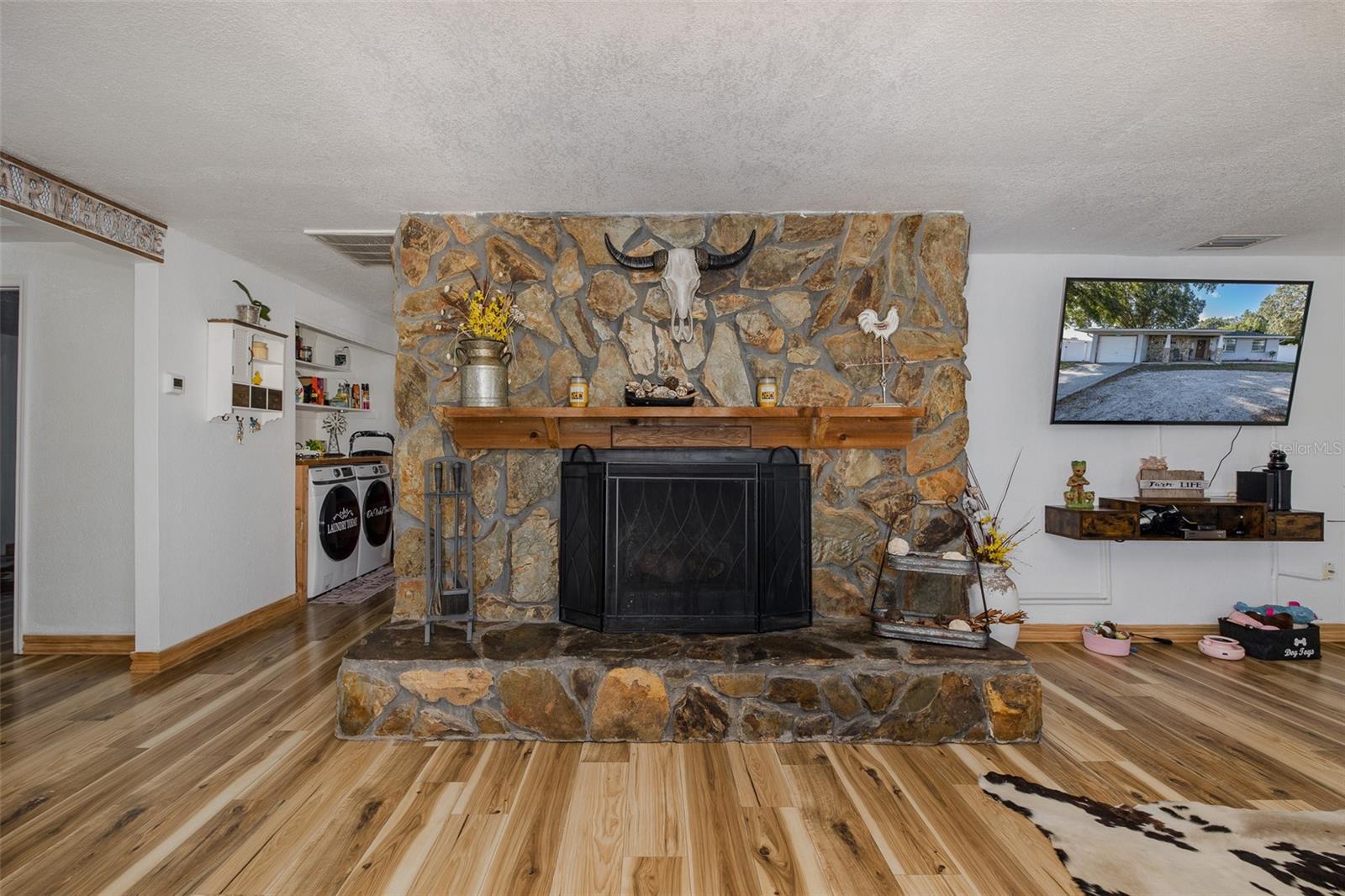 Large wood-burning stone fireplace