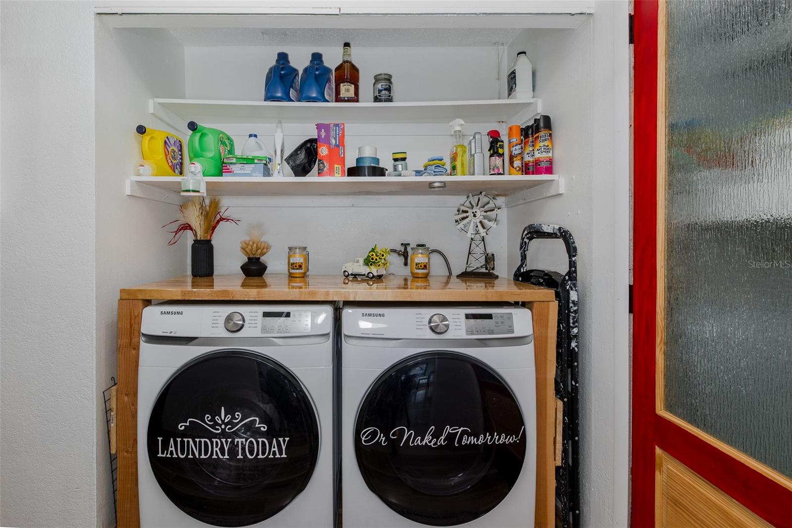 Laundry area and pantry adjacent to kitchen