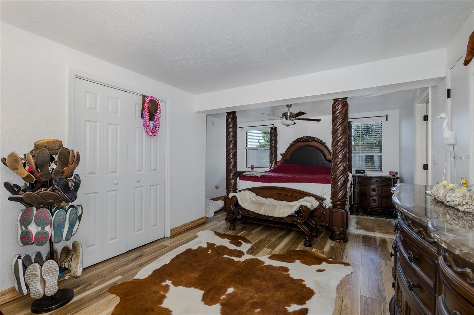Primary bedroom with three closets