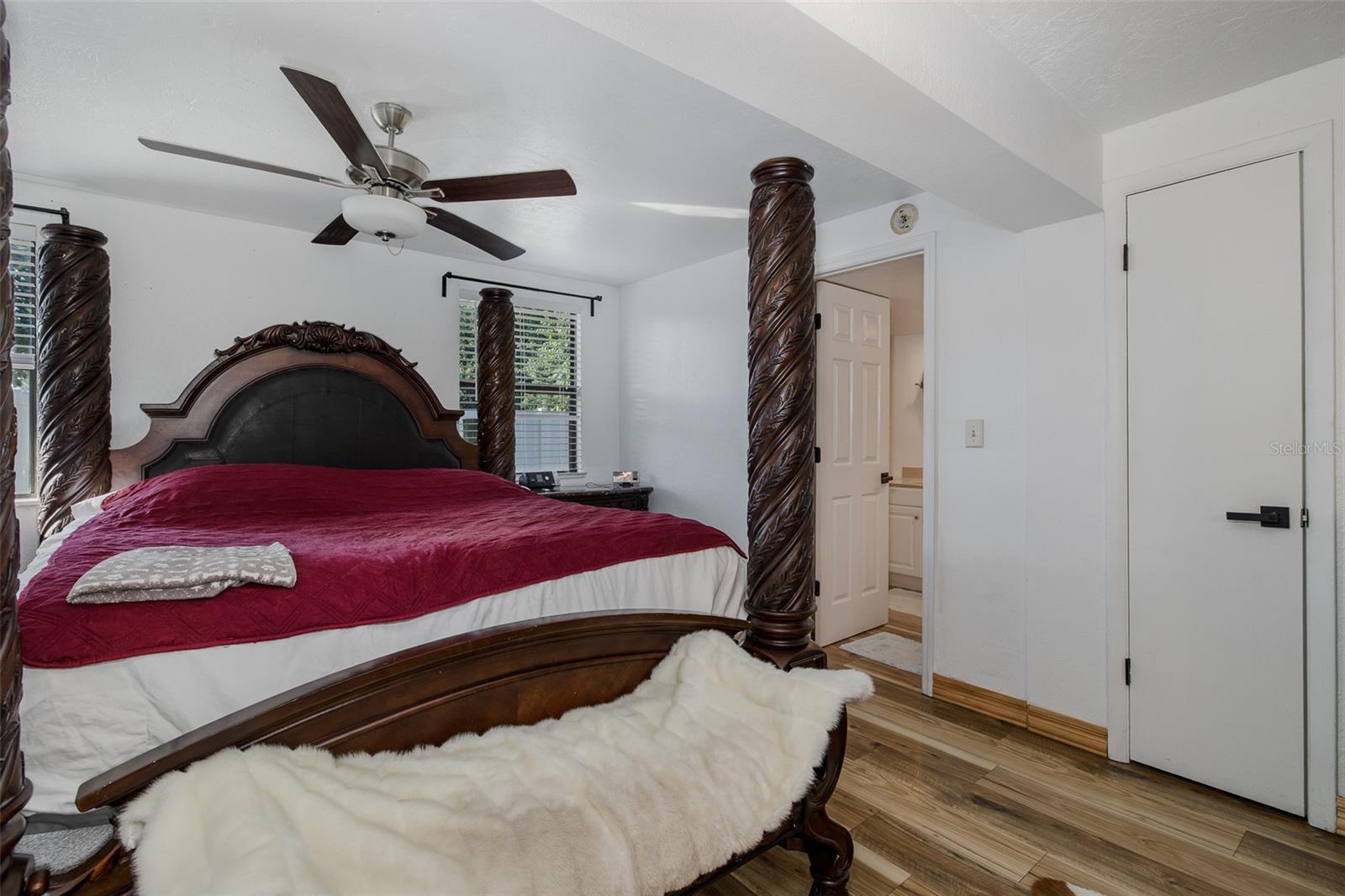 Ensuite bathroom door from primary bedroom