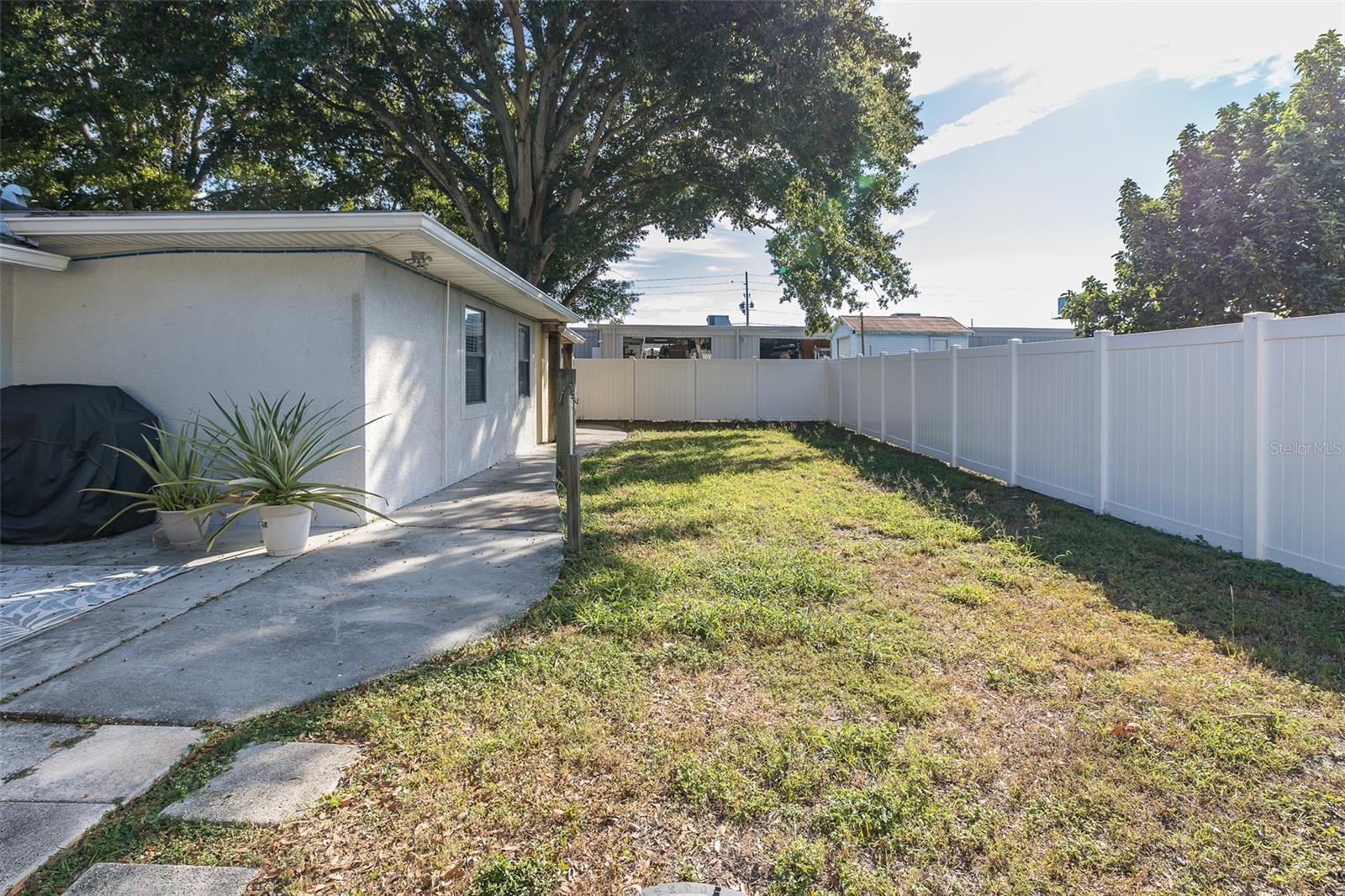 Completely fenced backyard