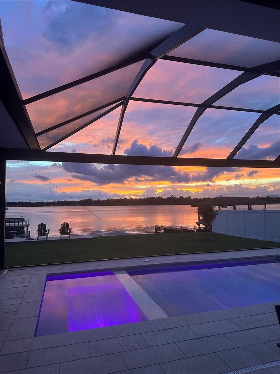 Sunset Over Lake and Pool