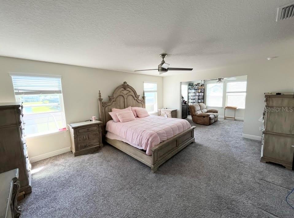 Master Bedroom on 2nd Floor (furnished) revealing the expansion and retreat