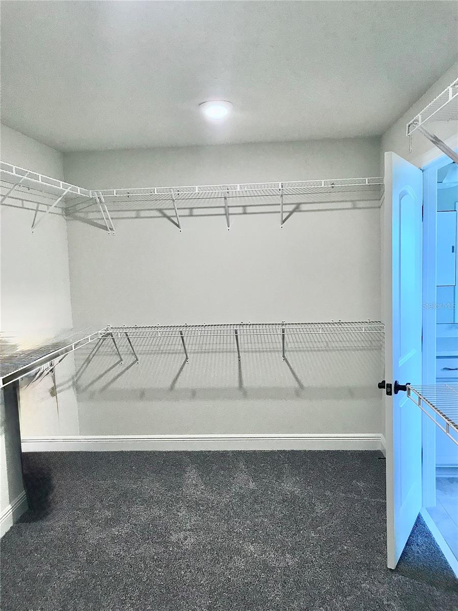 Master Bedroom closet facing out to the master bathroom