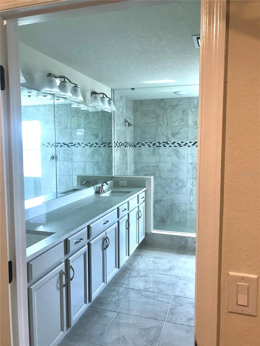 Master Bedroom Closet exiting into Master Bathroom