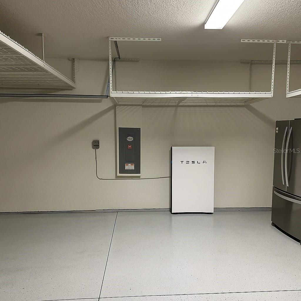 Garage with room for additional refrigerator / Storage for 2 Tesla Batteries for solar panels