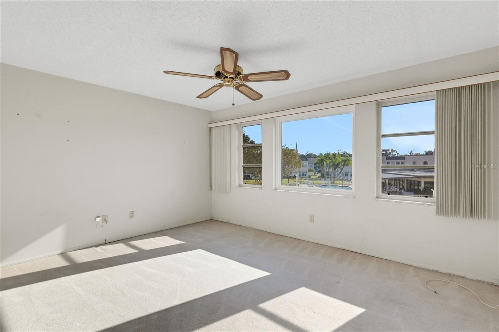3rd Bedroom/Home Office View of Pool and Clubhouse