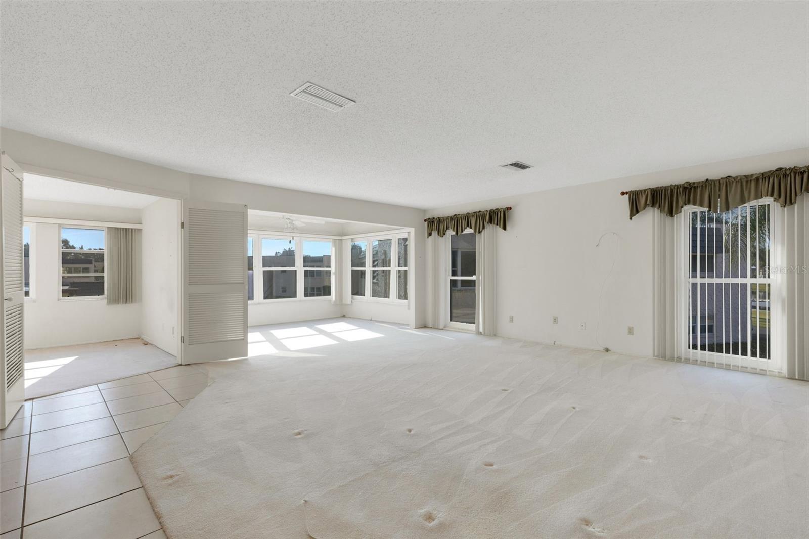 Living Room, Florida Room and 3rd Bedroom/Home Office