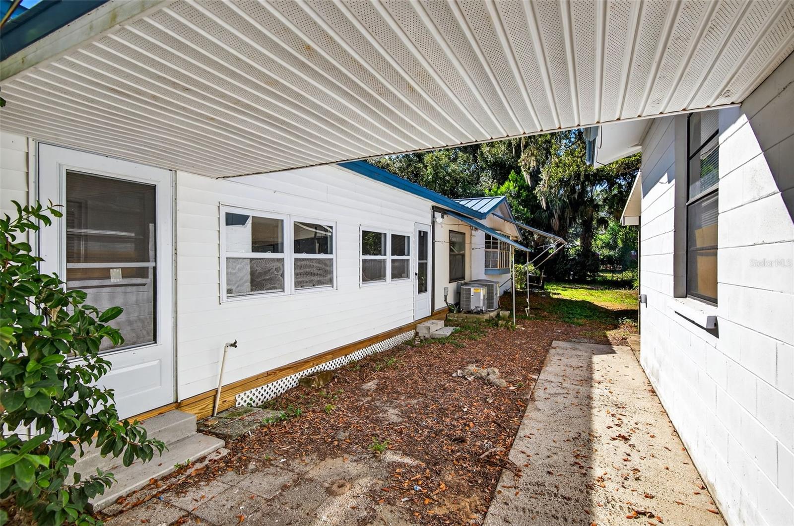 Covered Walkway from House to Garage