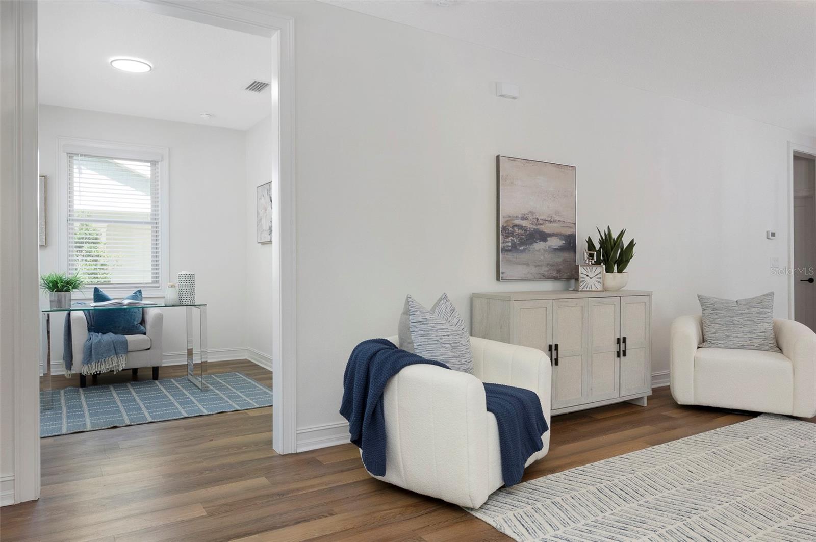 Living Room Leading to Front Office/Bedroom