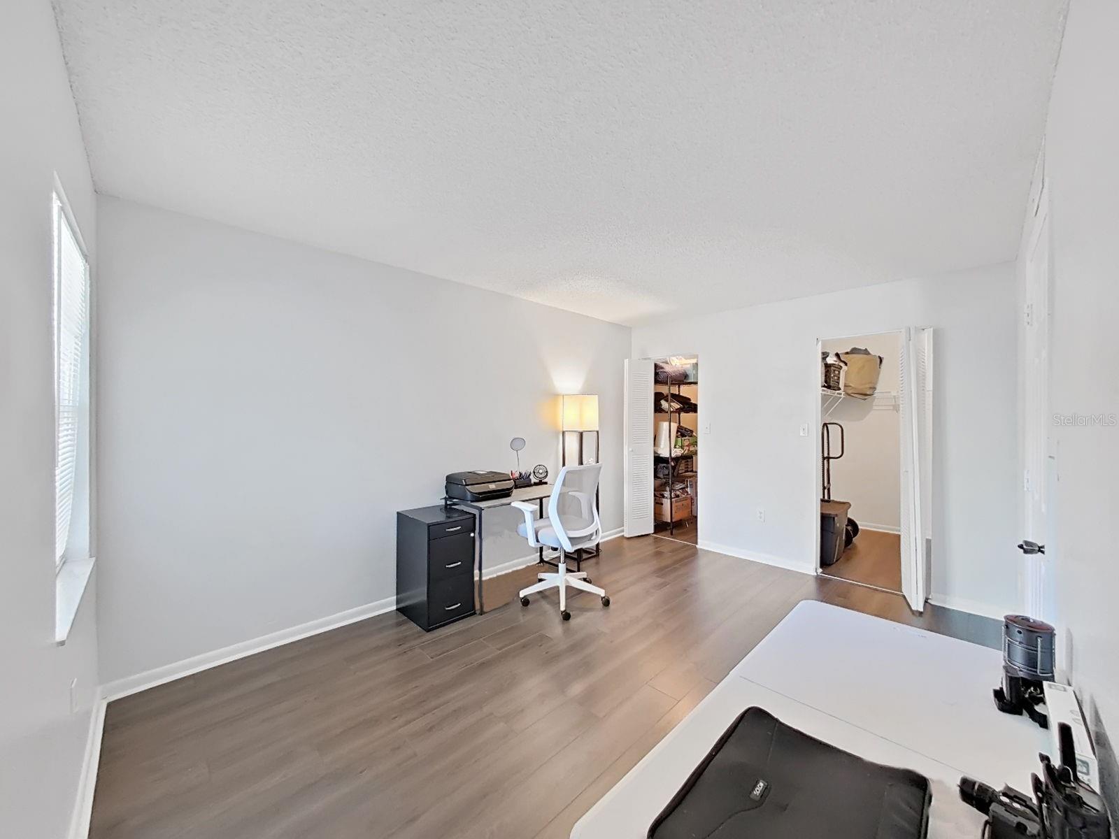 Bedroom 3 with a walk-in closet and walk-in storage or another closet!