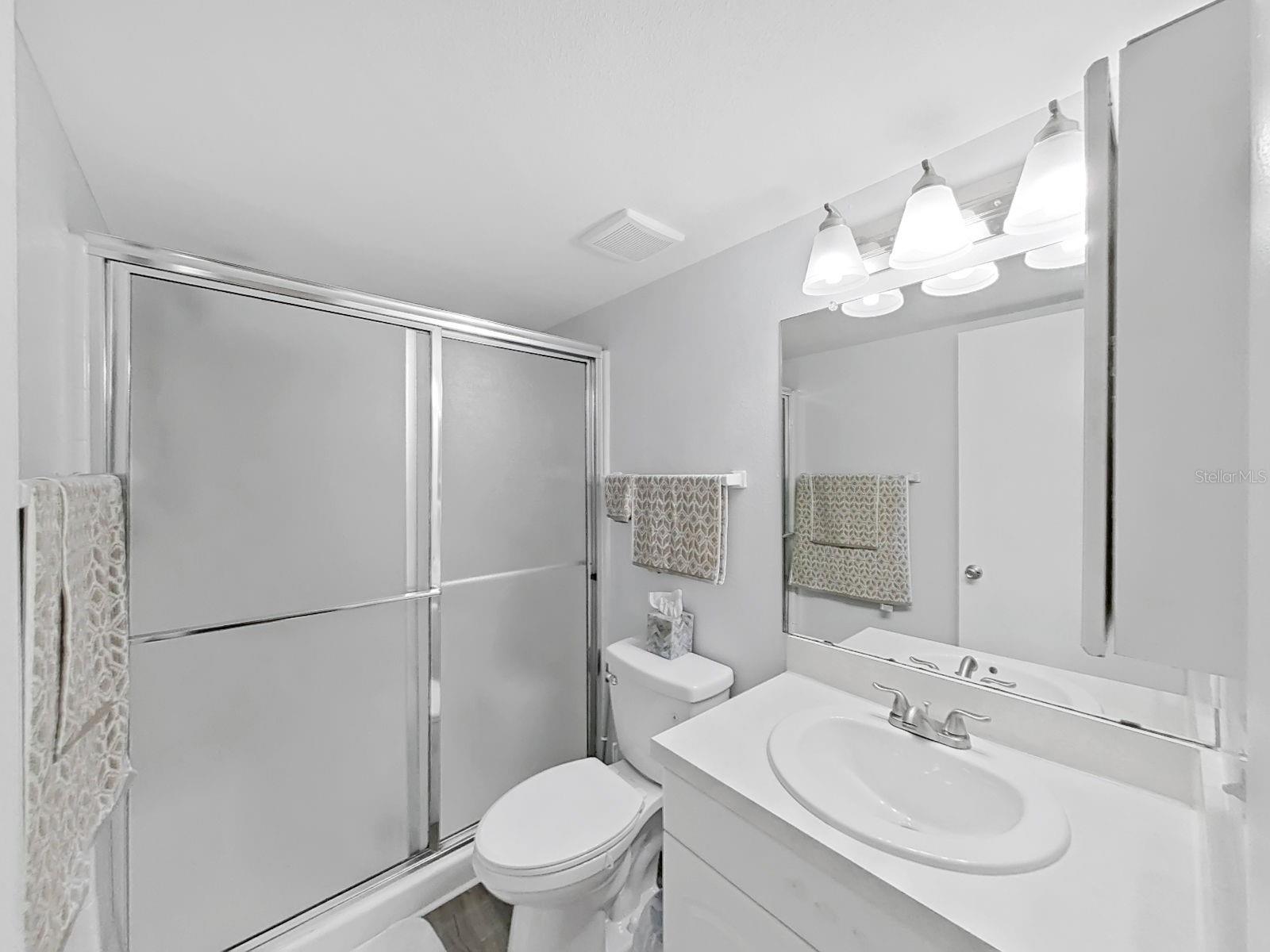Primary ensuite bathroom offers privacy, convenience, and comfort!