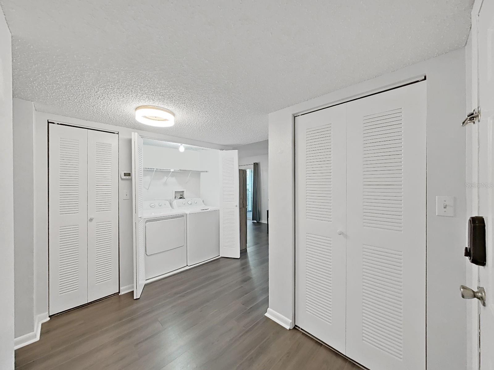 Hall has your Washer/Dryer in a convenient closet!