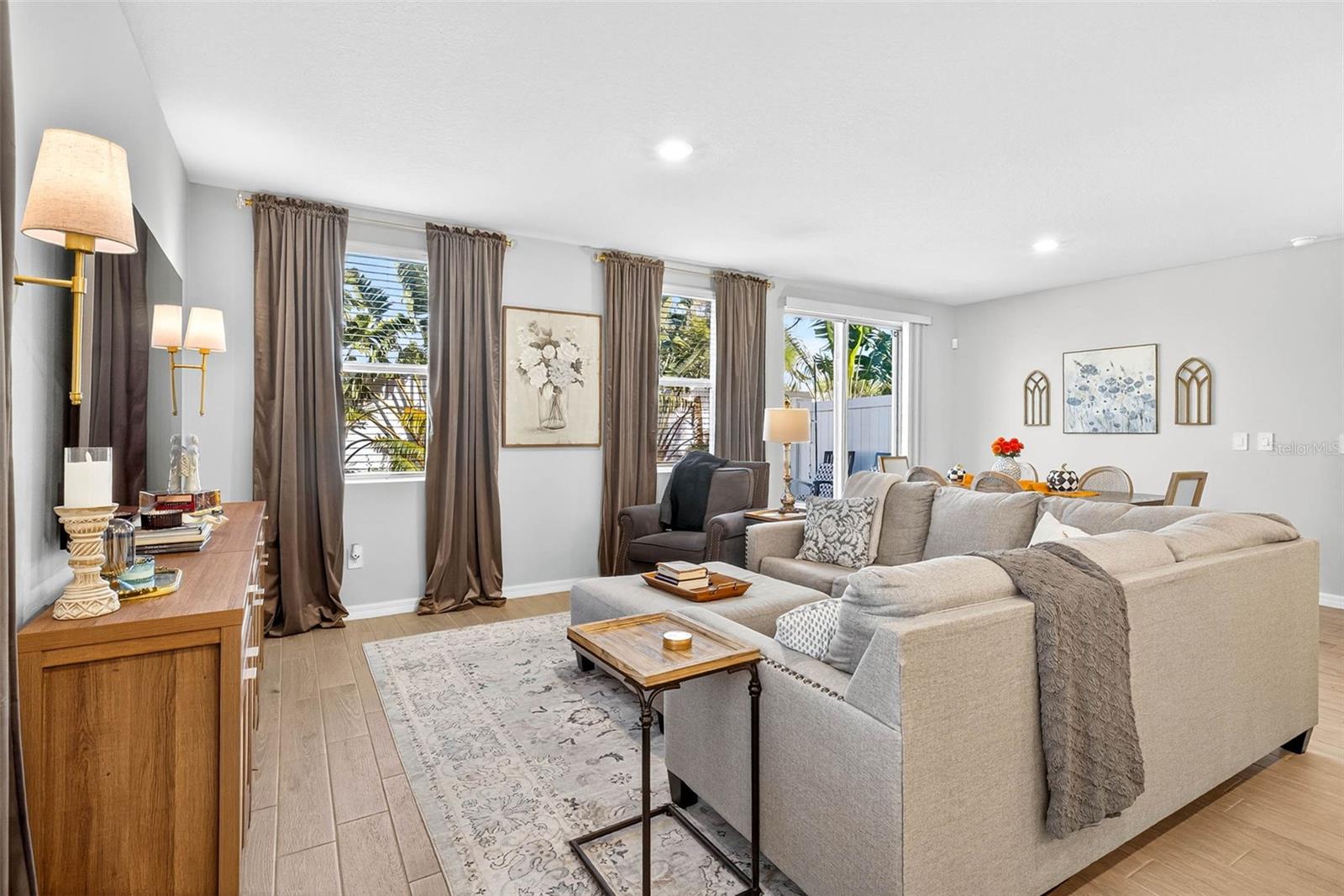 Living room looks out to the privacy fencing and NO REAR NEIGHBORS