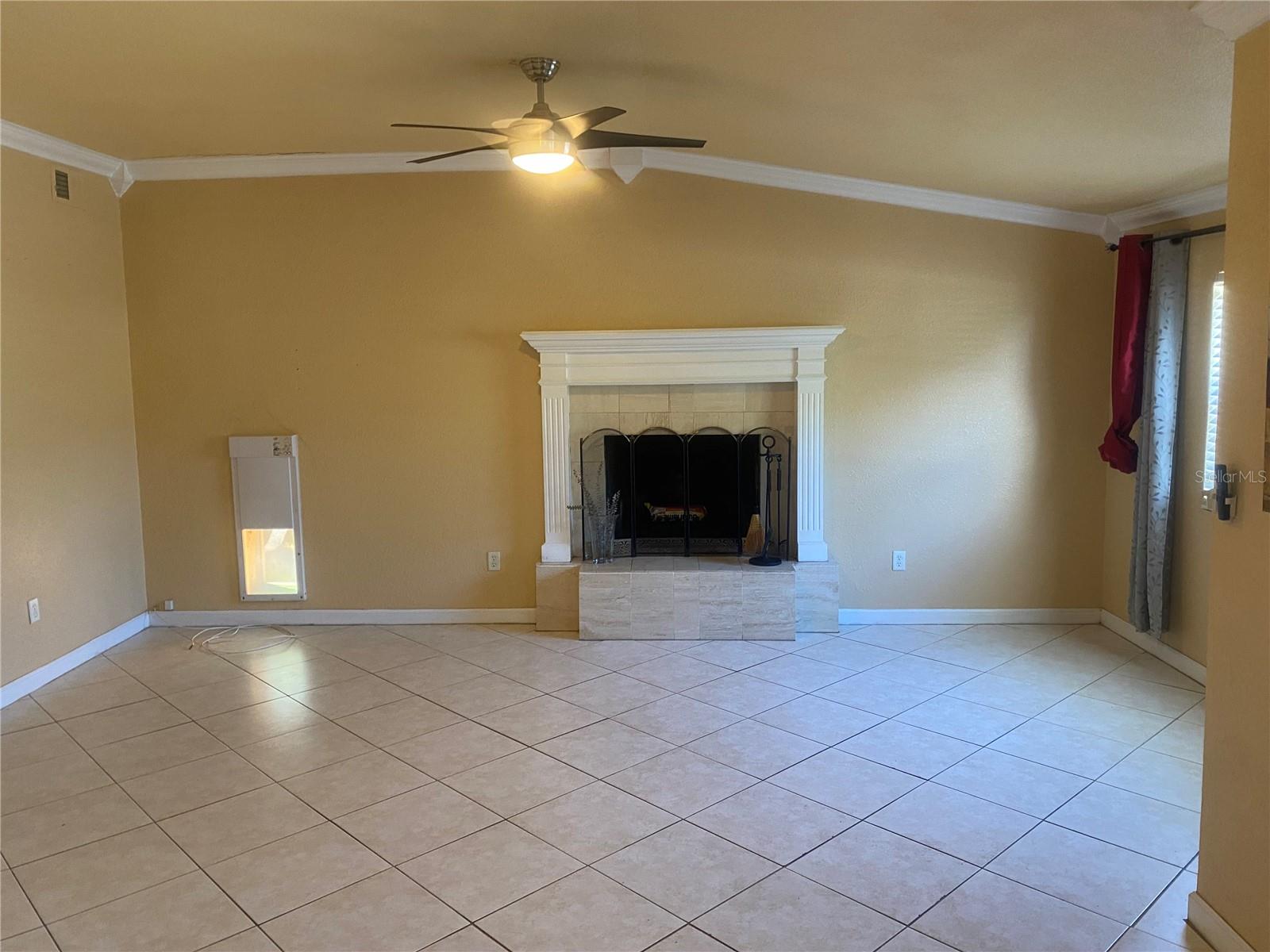 Living Rm With Wood burning Fire Pl