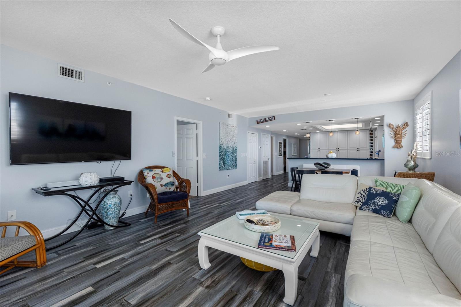 .. Designer 8'7" Ceiling Heights - New Tile Plank Flooring. Possible Turnkey Purchase. Spacious Great Room Dimensions 27' X 16'5"... Compare To Your Own Living Room. Corner Unit Provides Plenty of Natural Light.