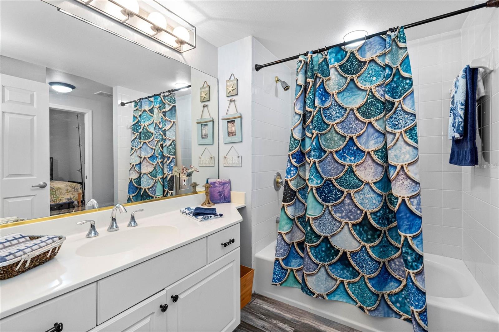 .. Bathroom #2 Can Be Accessed From Hallway and Or Privately From  Guest Bedroom. Perfect for Family Flexibility.