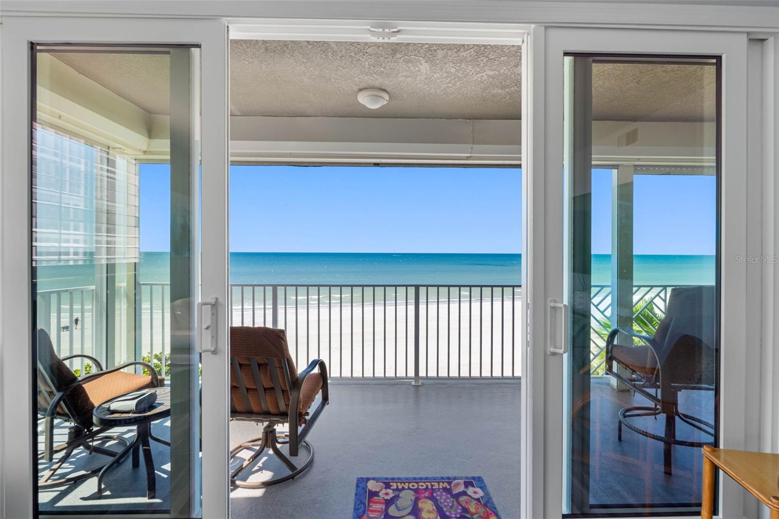 .. New Balcony Sliders - Strom Shutters - New Windows  - New Flooring in Living Areas - 33 ' Long Gulf Front Balcony.