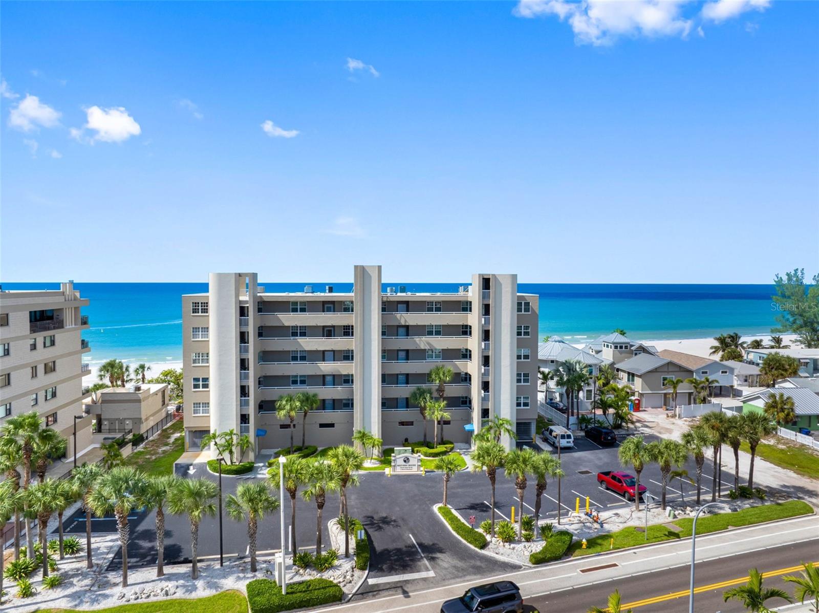 ... New Roof - New Ext Paint - New Refurbished Parking Lot. Milestone Report All Completed and Work Finished. It's Time To Relax and Enjoy Our Carefree Beach Living.
