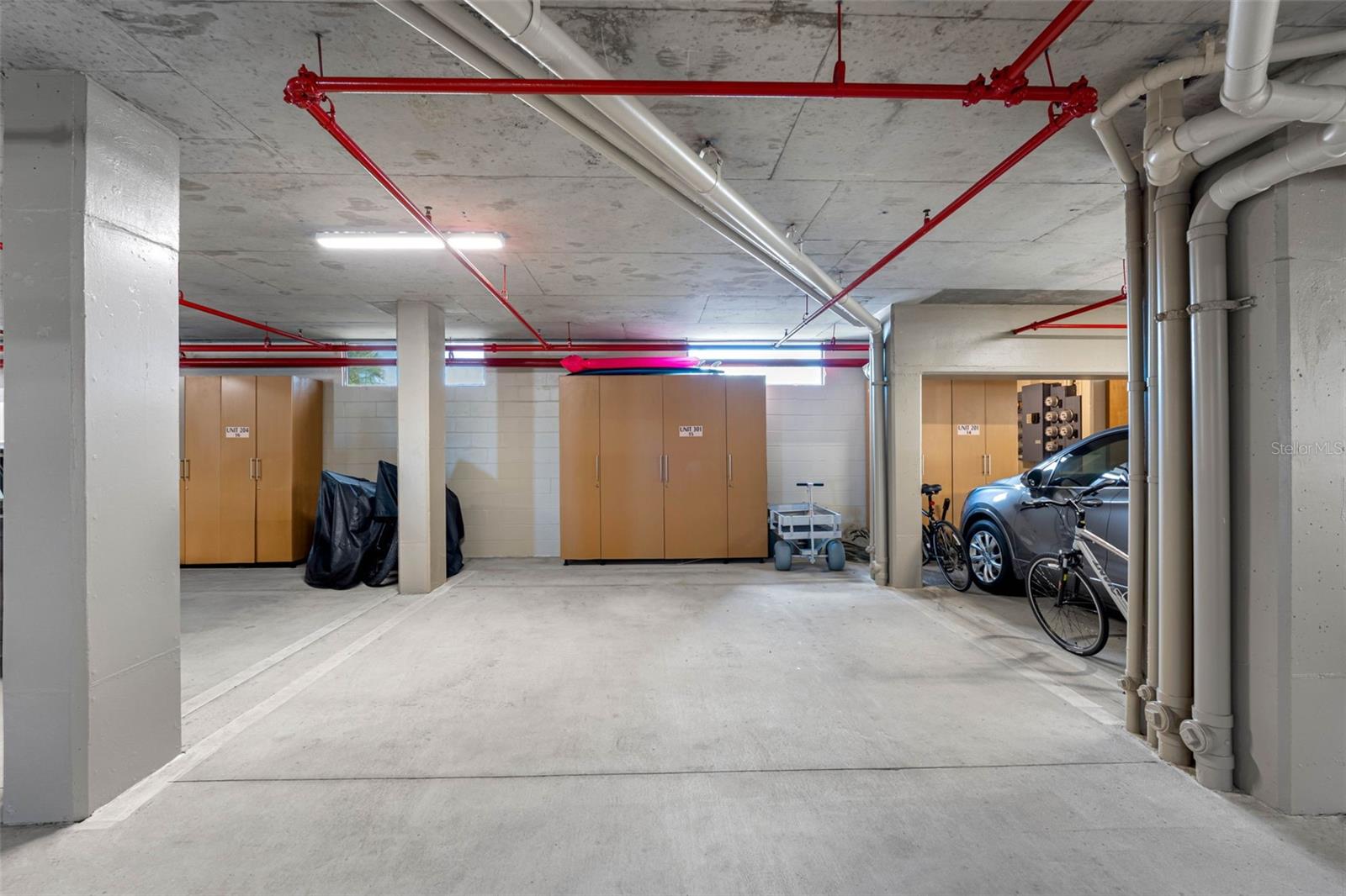 .. Extra Wide 14' X 18' Parking Spot in Garage. Private Storage For Each Unit Against Wall By Your Spot. 14 Foot Wide Spots are Rare and Delighful To Use.. Complex is Well Kept.