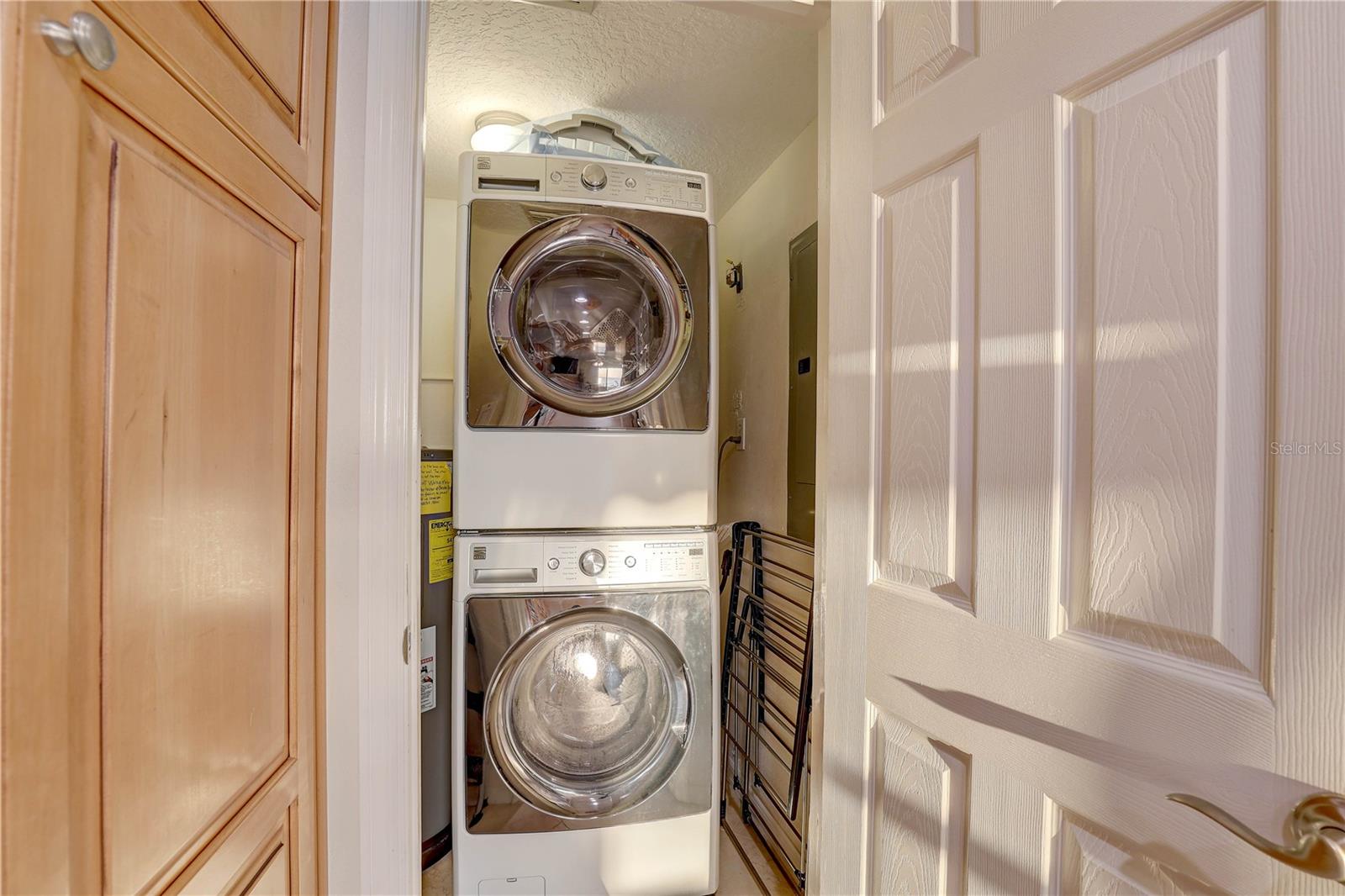 Indoor laundry area ~ full-size washer/dryer