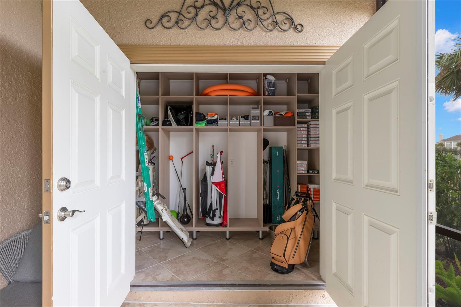 Custom storage closet in the downstairs patio