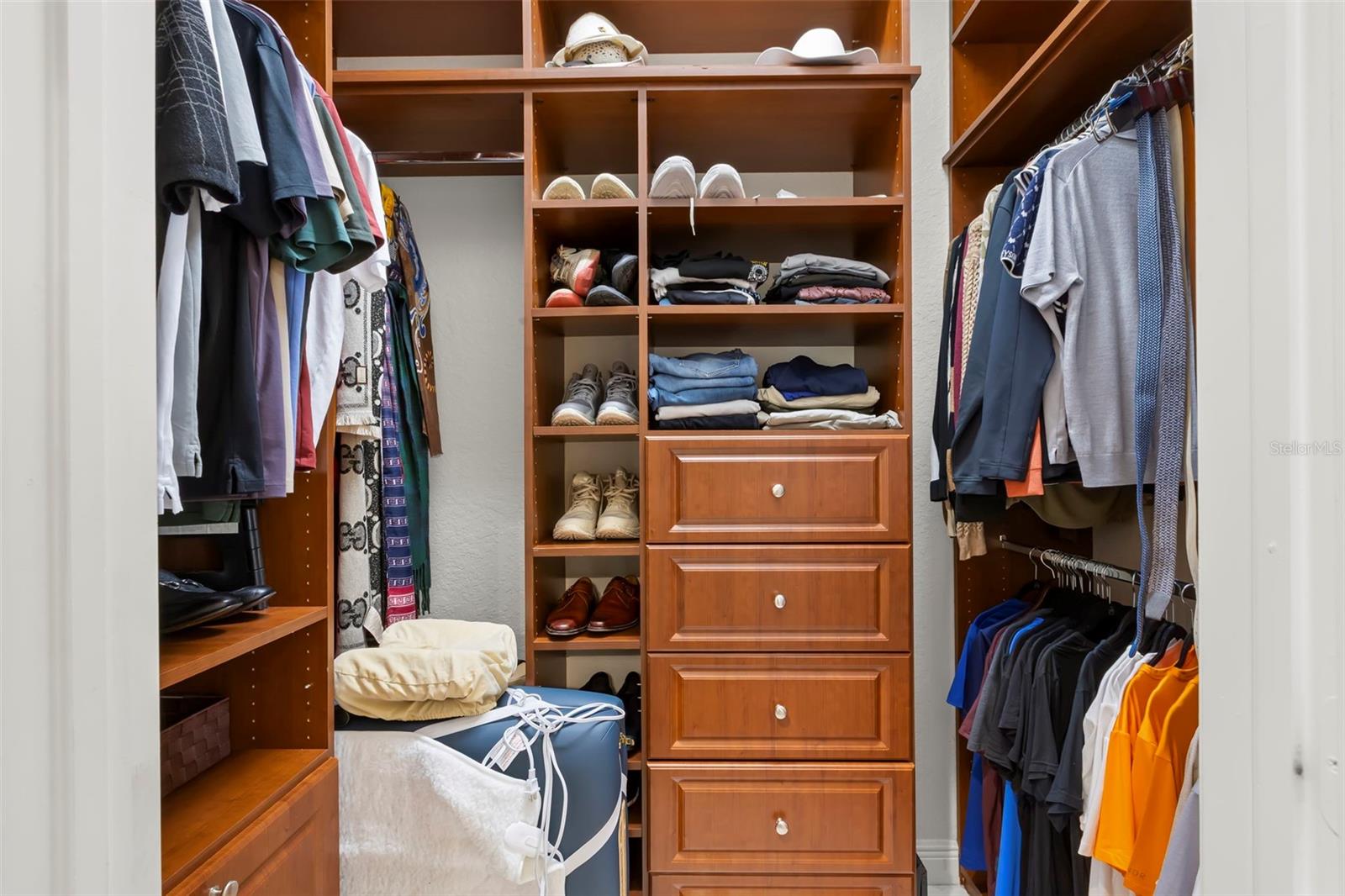 Secondary closet in primary bedroom.