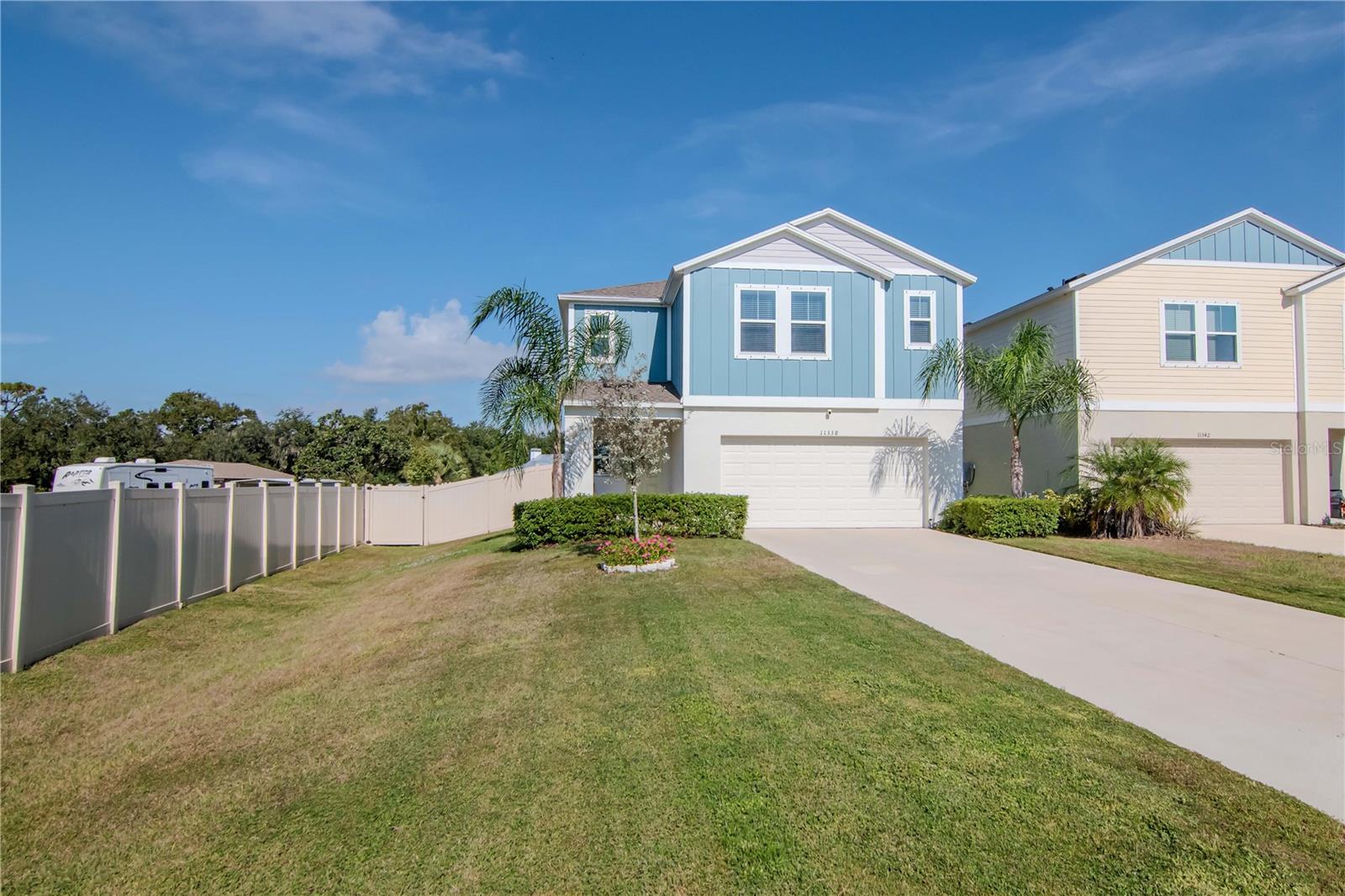 View of Extended Front Yard and Driveway